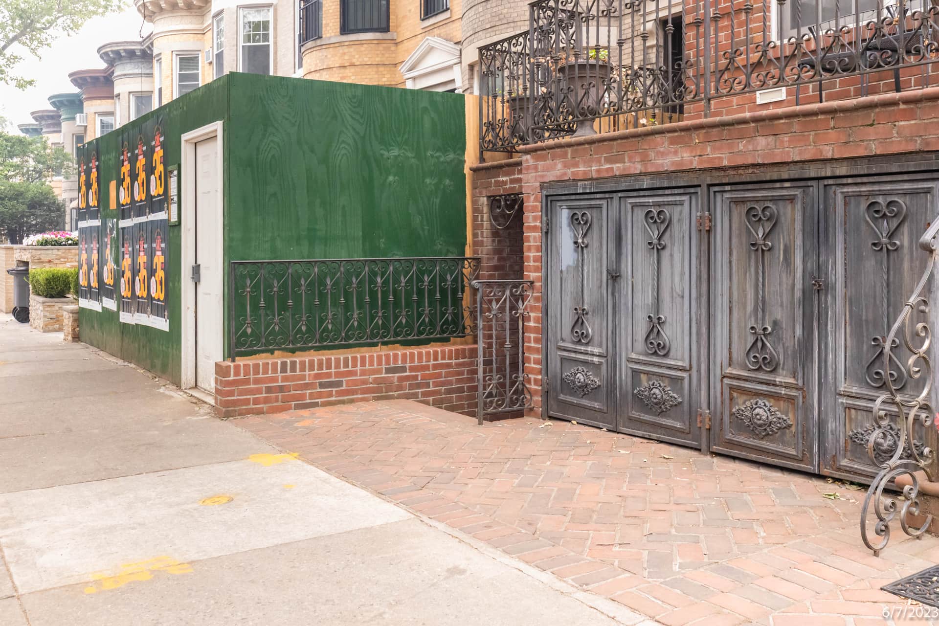 Exterior brick facade and sidewalk existing conditions documented in an OpenDoors360 pre-construction survey in New York City.